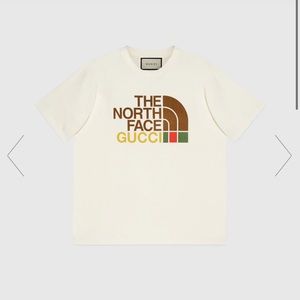Gucci and North Face  oversized graphic t-shirt.  Brand new with tags size Xs